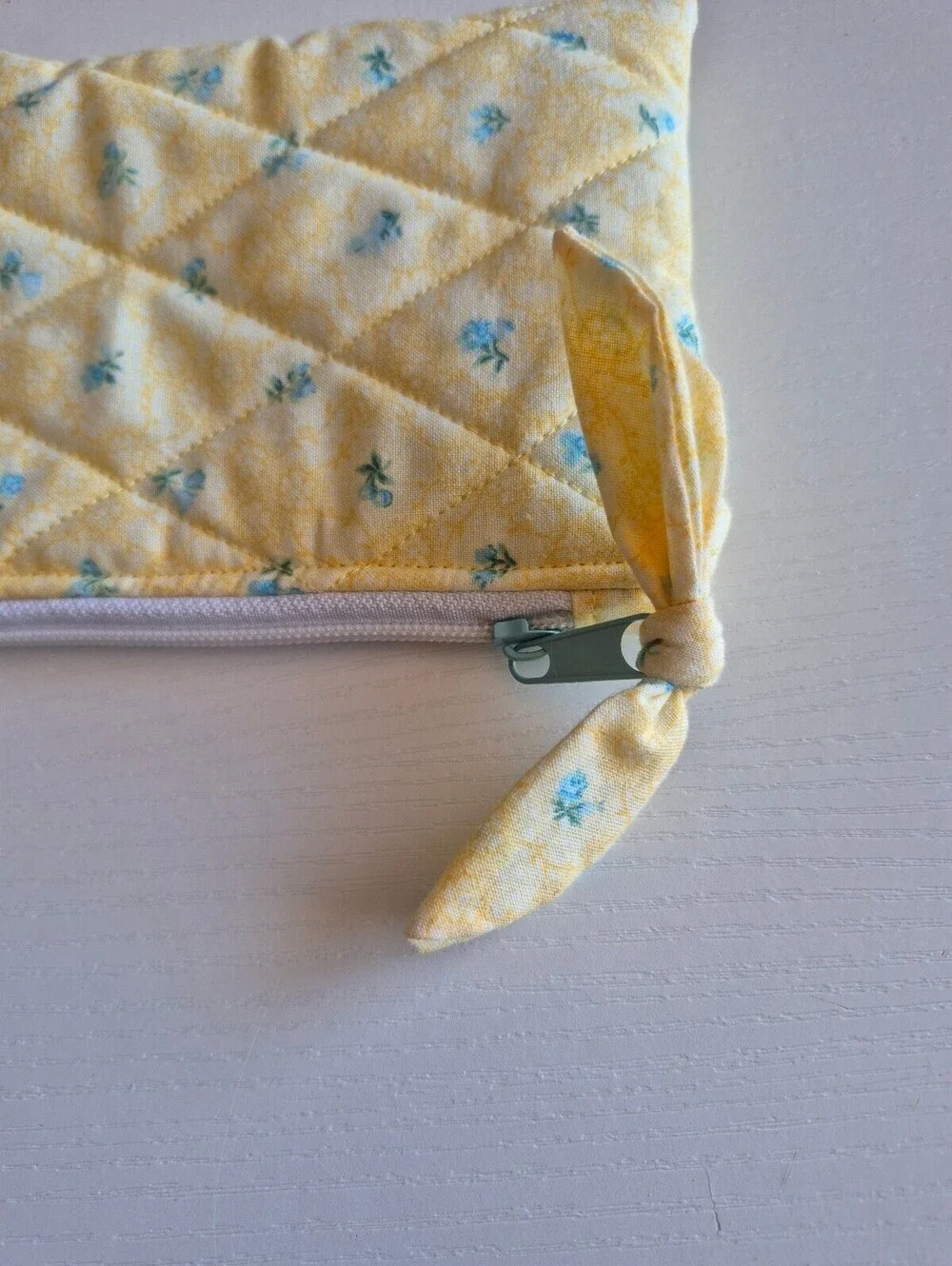 Quilted bow pouch